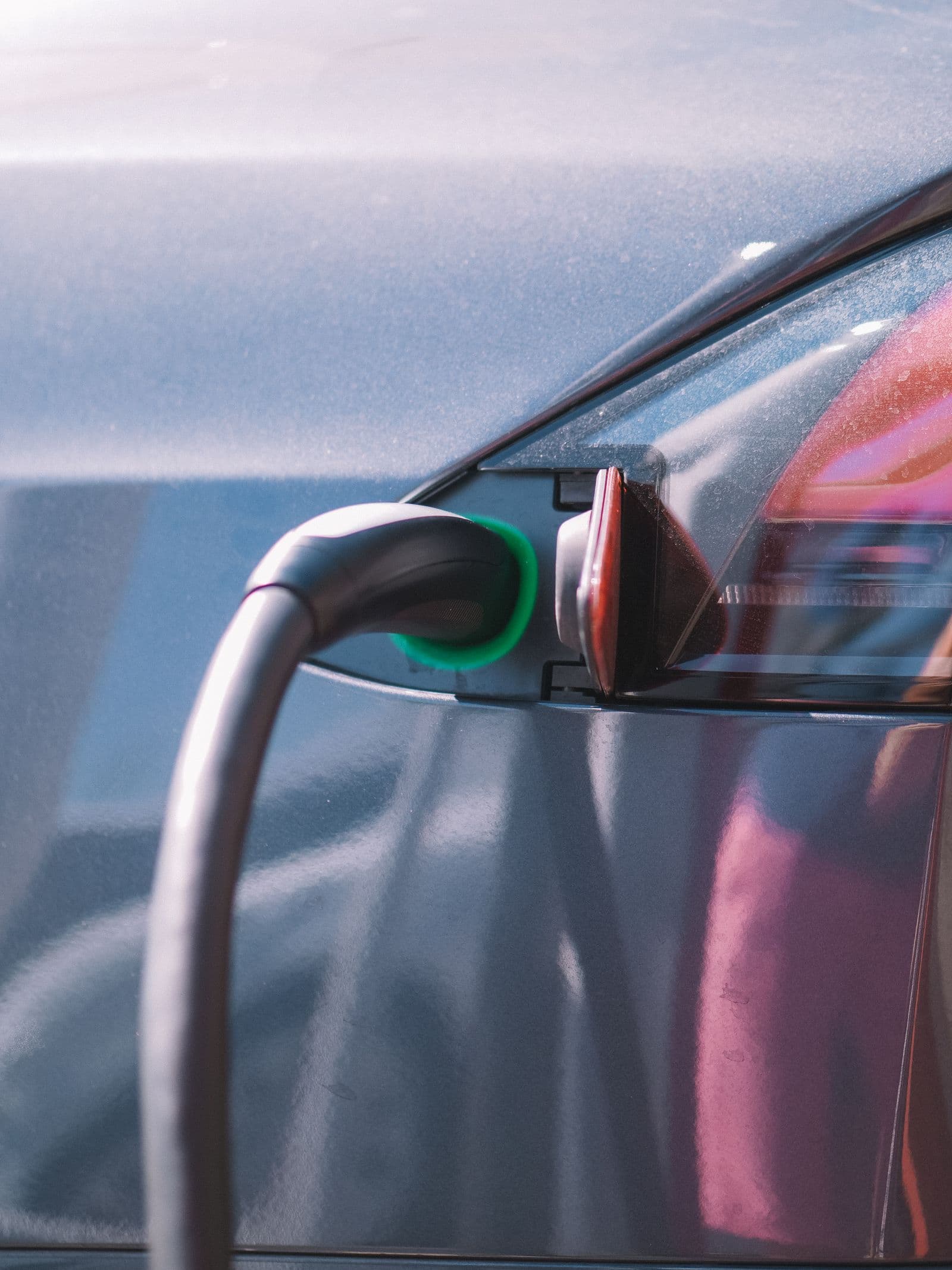 Charging cable plugged into an electric vehicle's charge port